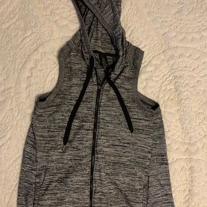 Gray sleeveless athletic shirt with zipper.